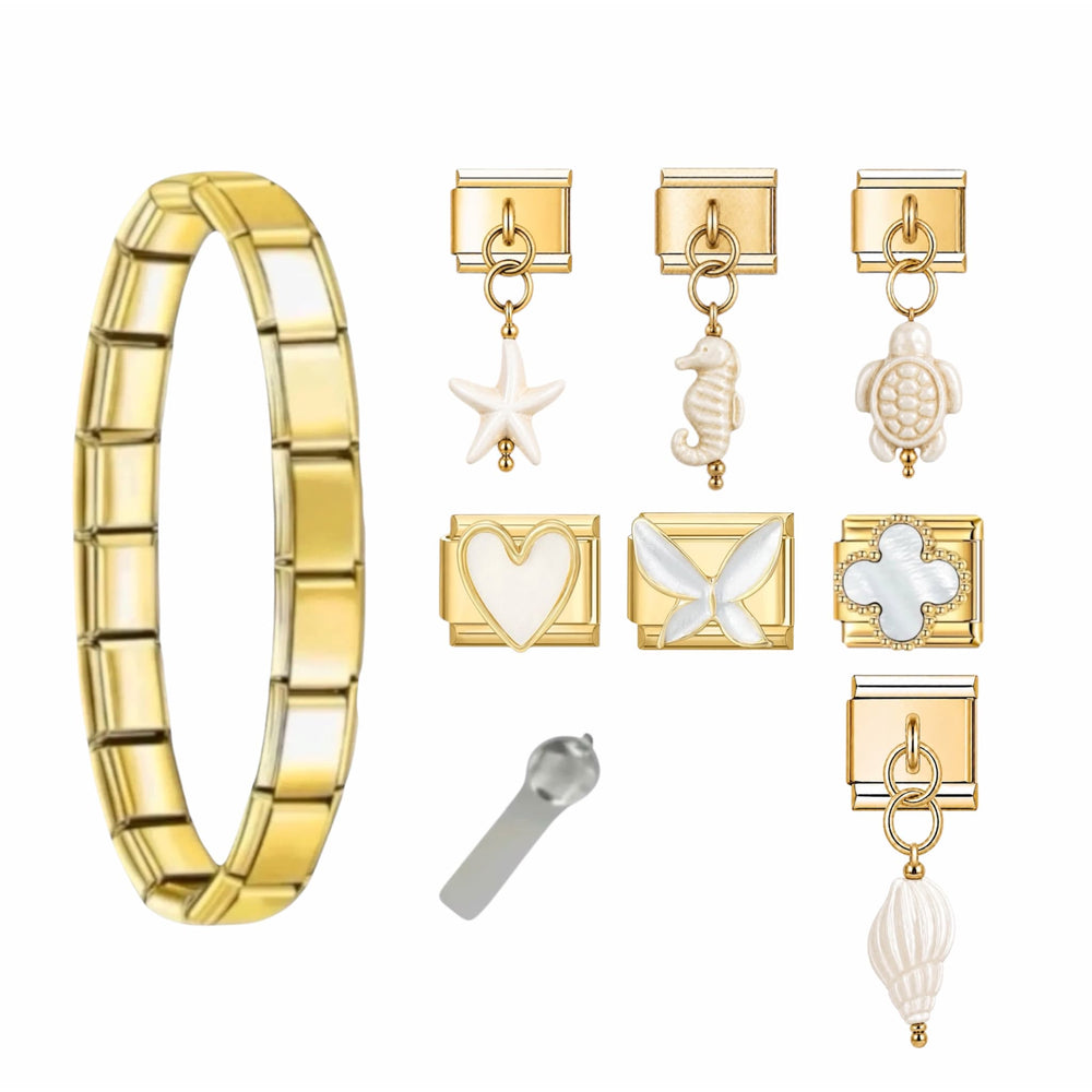 Bracelet Costa Bianca en acier inoxydable doré et charms céramique blanche, vue détaillée